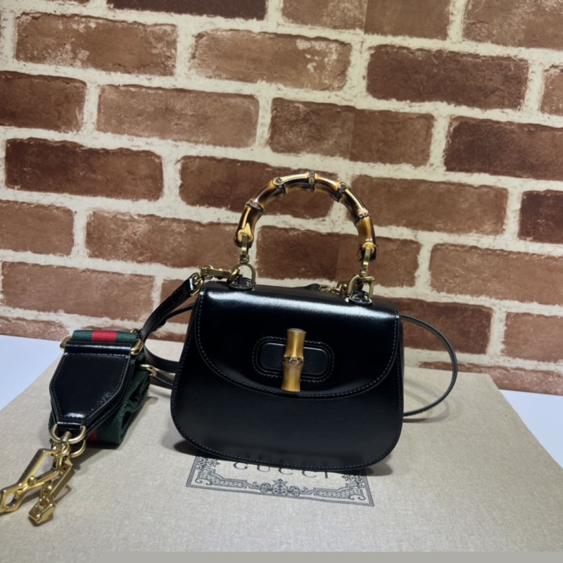 G*u*i top handle bags